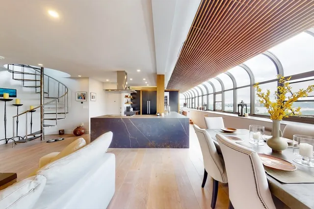 a view of a dining room with furniture