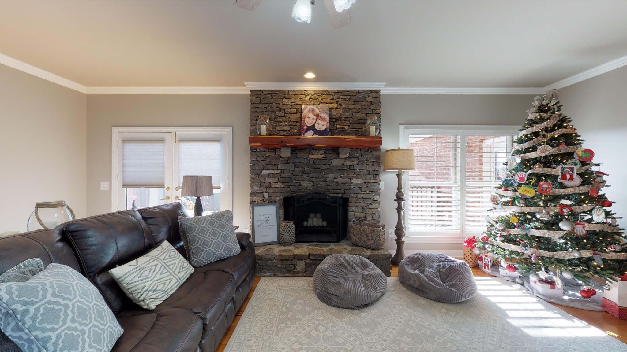 7450 Delbridge Road Murfreesboro, TN 37127 - Photo 21 of 50 a living room with furniture and a fireplace