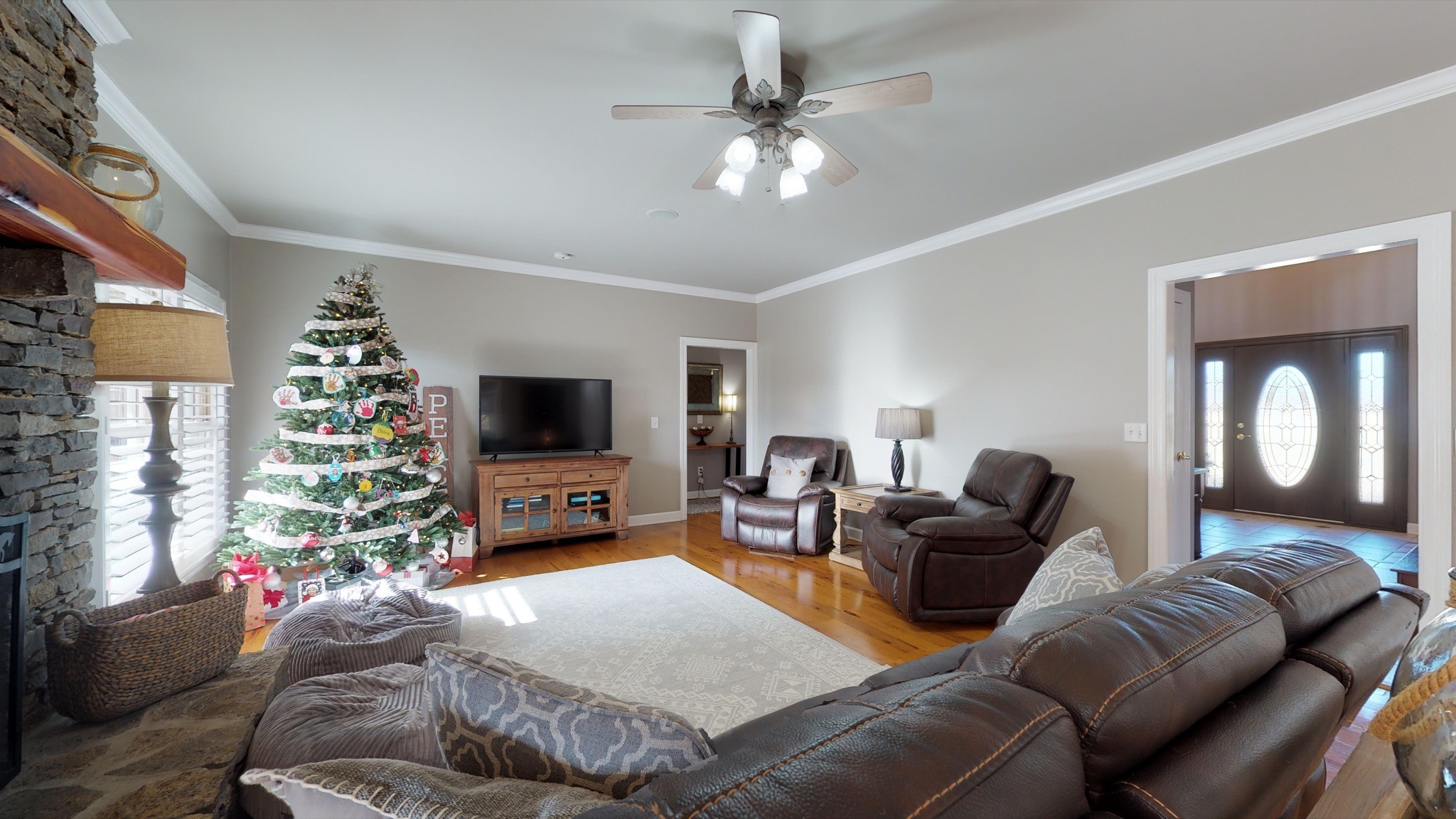 7450 Delbridge Road Murfreesboro, TN 37127 - Photo 23 of 50 a living room with furniture and a flat screen tv