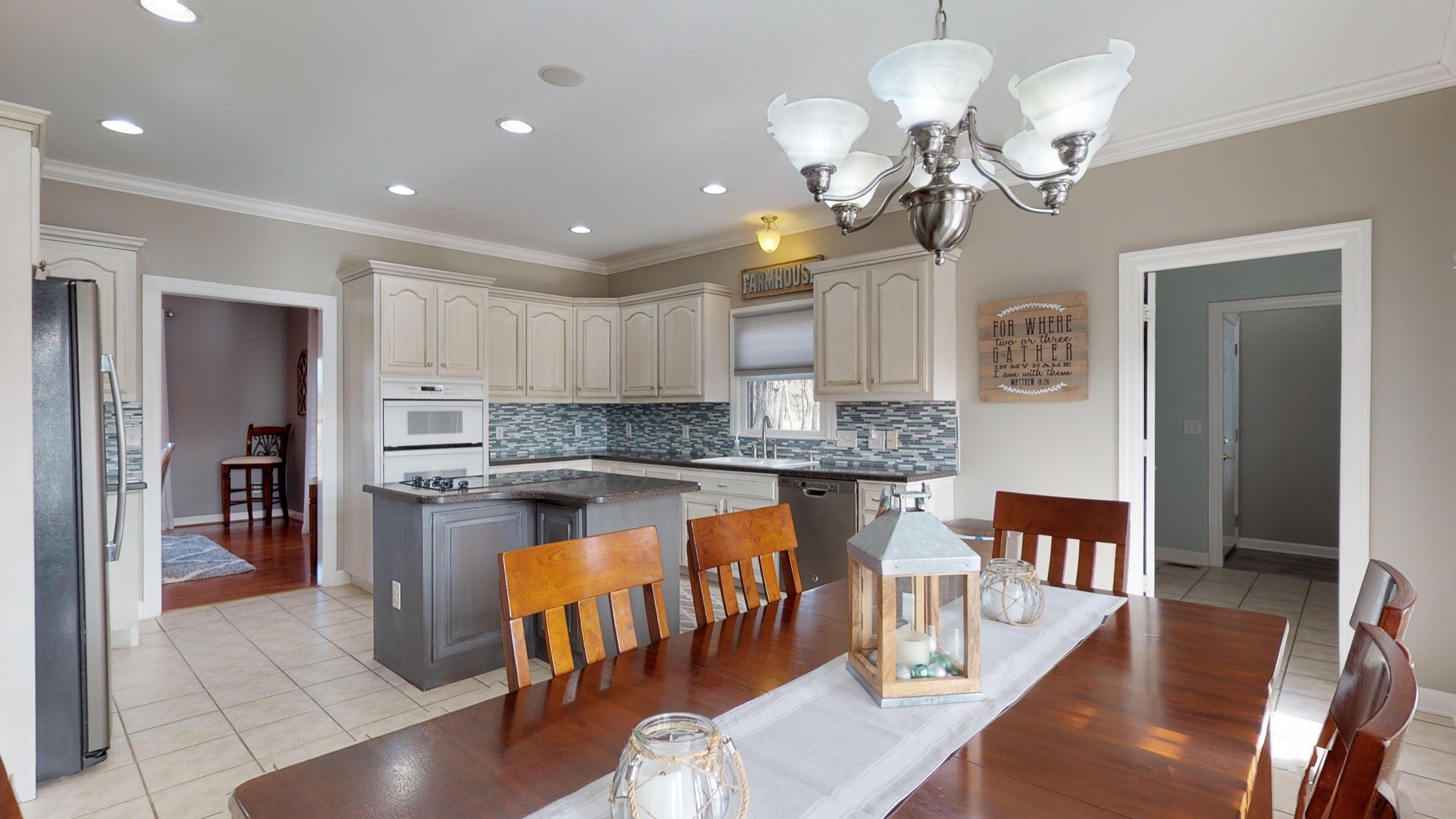 7450 Delbridge Road Murfreesboro, TN 37127 - Photo 24 of 50 a large kitchen with a table and chairs