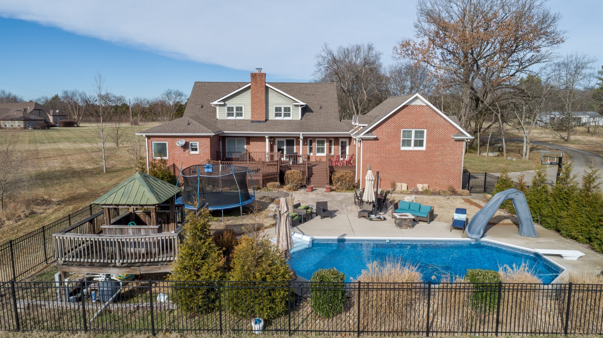 7450 Delbridge Road Murfreesboro, TN 37127 - Photo 4 of 50 a view of a house with backyard and sitting area