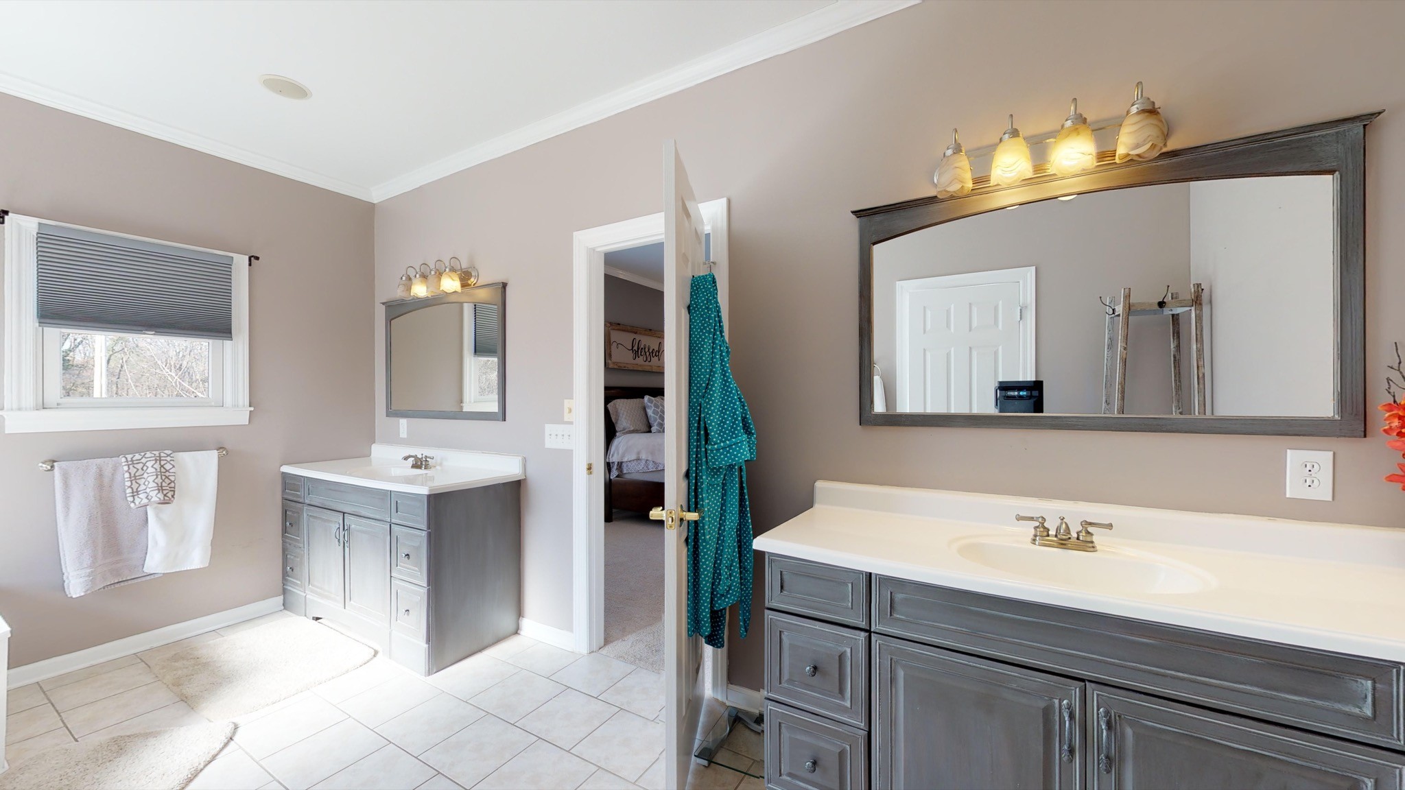 7450 Delbridge Road Murfreesboro, TN 37127 - Photo 31 of 50 a bathroom with a sink double vanity and a mirror