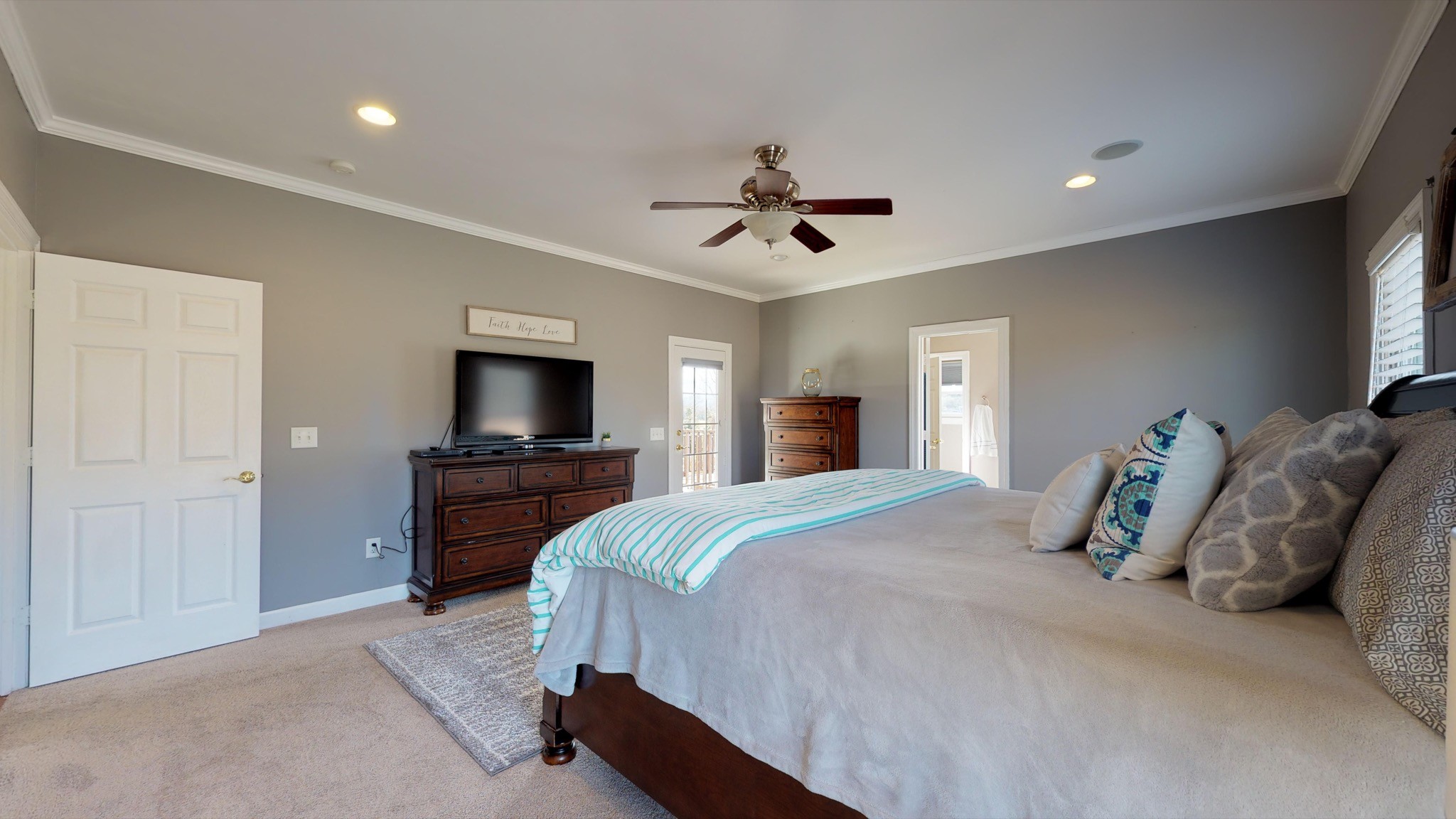7450 Delbridge Road Murfreesboro, TN 37127 - Photo 33 of 50 a bedroom with a bed and a television