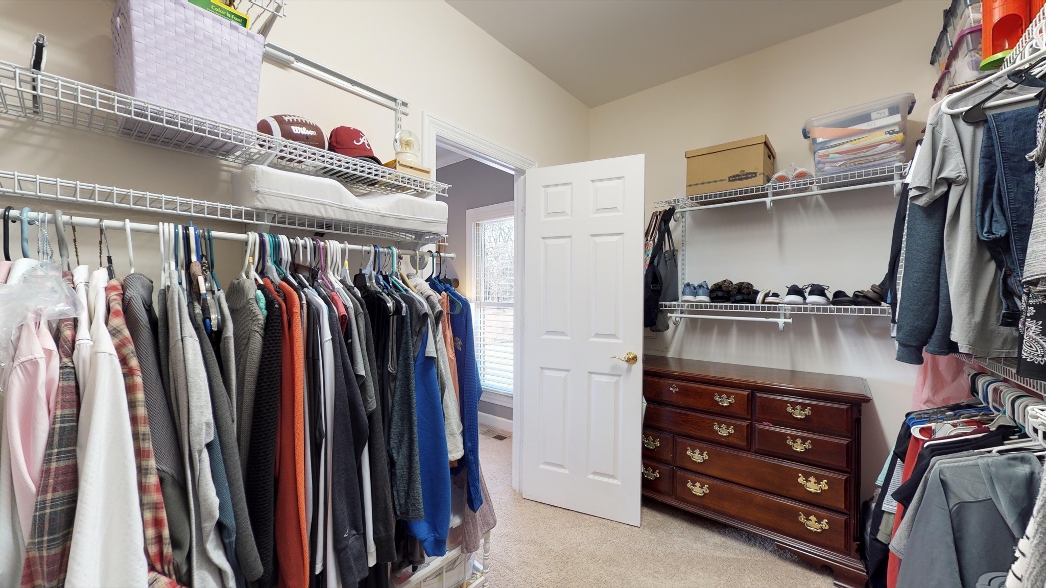 7450 Delbridge Road Murfreesboro, TN 37127 - Photo 39 of 50 a view of walk in closet with clothes and shoes