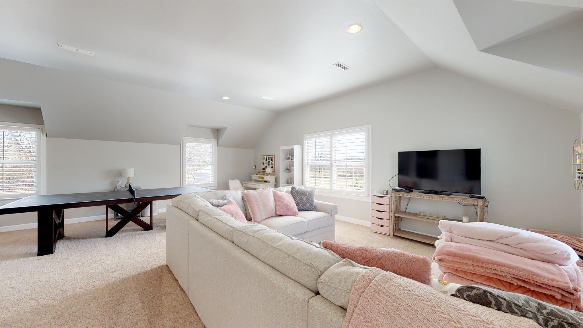 7450 Delbridge Road Murfreesboro, TN 37127 - Photo 42 of 50 a living room with furniture and a flat screen tv