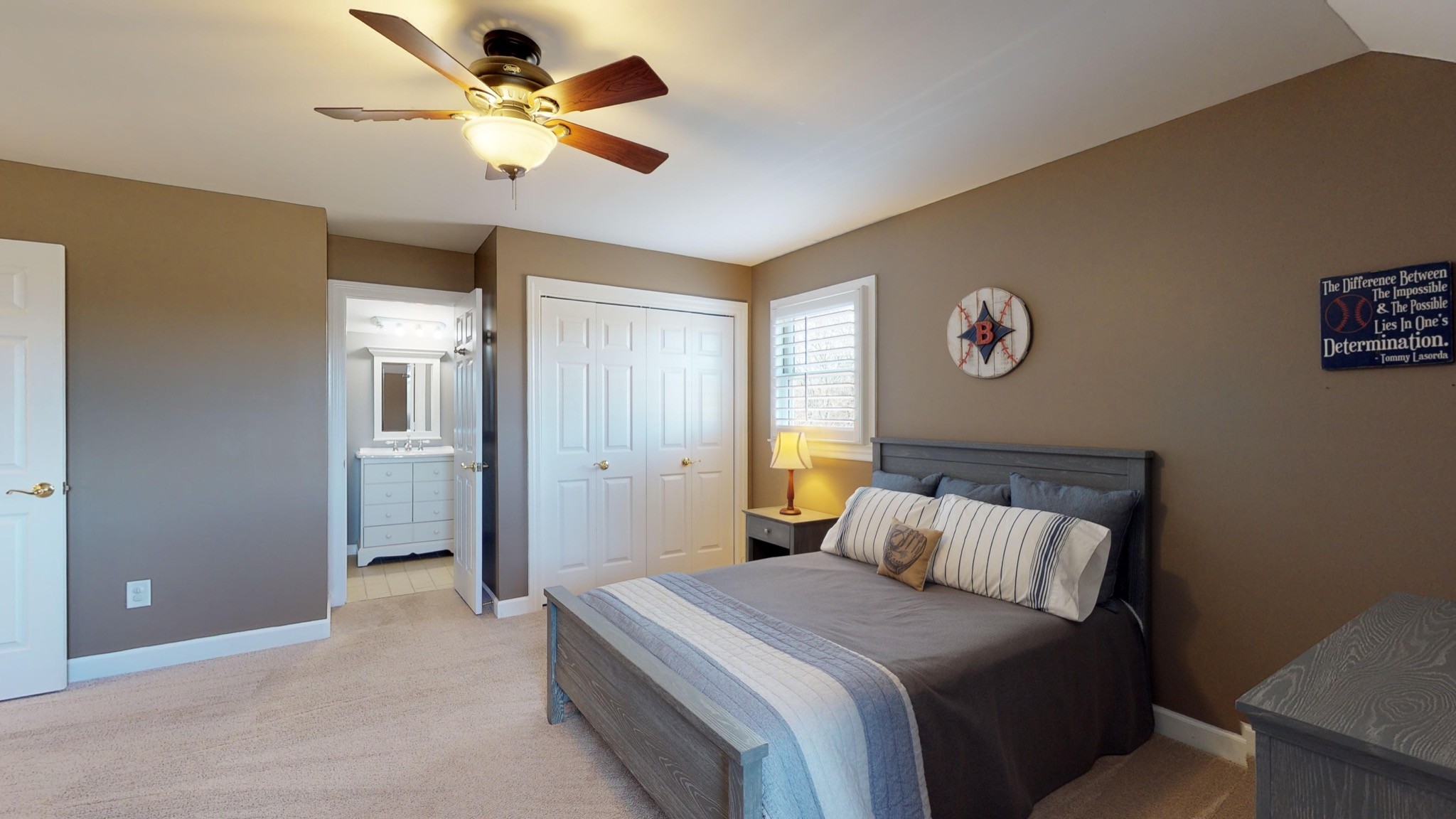 7450 Delbridge Road Murfreesboro, TN 37127 - Photo 43 of 50 a bedroom with a bed and a chandelier