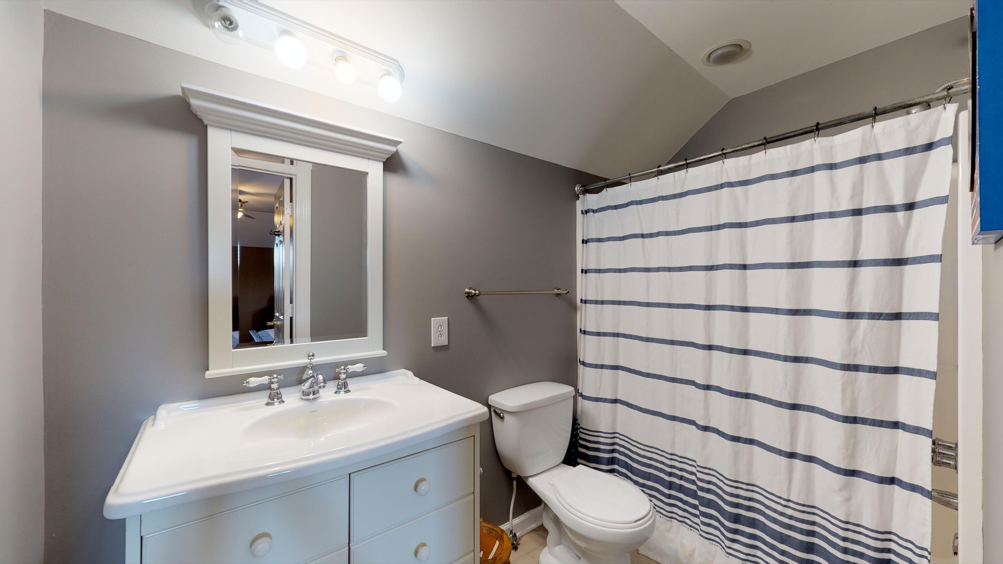 7450 Delbridge Road Murfreesboro, TN 37127 - Photo 45 of 50 a bathroom with a sink toilet and shower