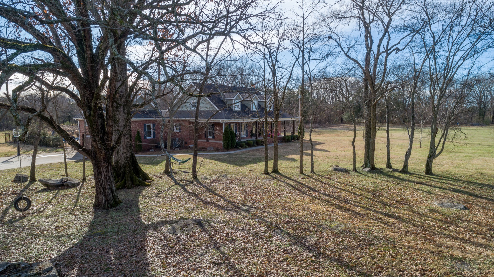 7450 Delbridge Road Murfreesboro, TN 37127 - Photo 6 of 50 a view of a yard with a tree
