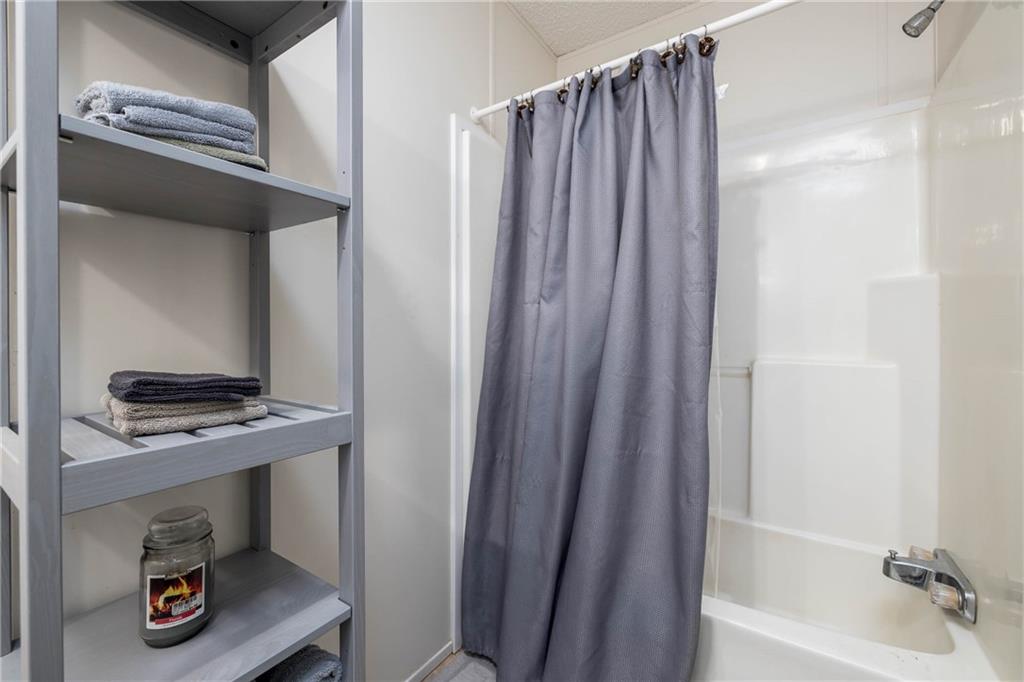 476 Hewitt Run Wind Ridge, PA 15380 - Photo 11 of 28 a bathroom with a tub and shower
