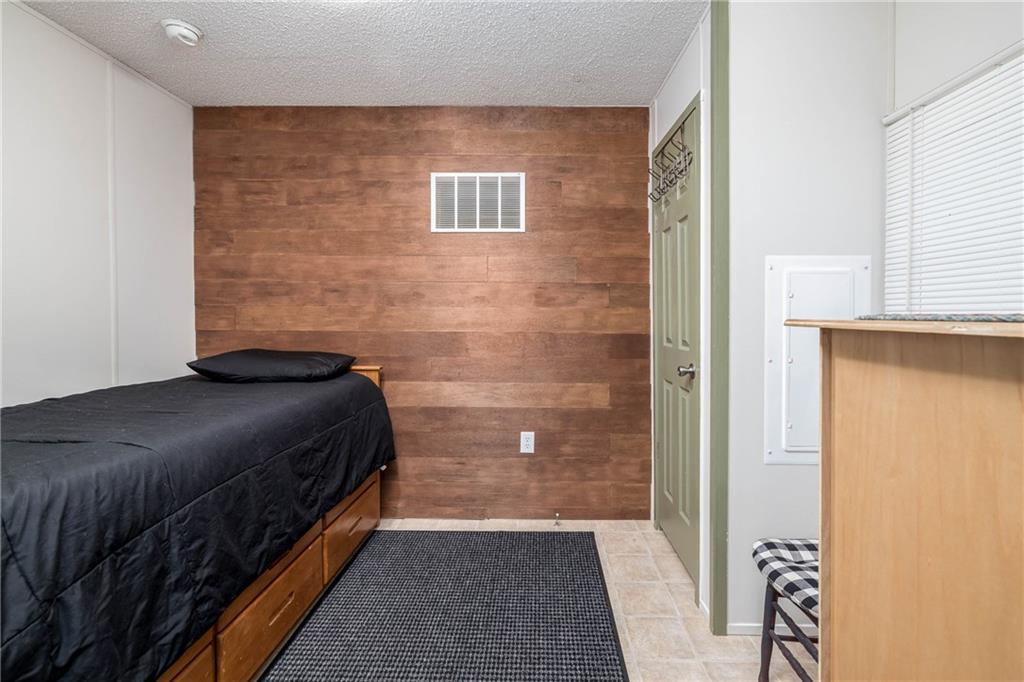 476 Hewitt Run Wind Ridge, PA 15380 - Photo 13 of 28 a bedroom with a bed and a window