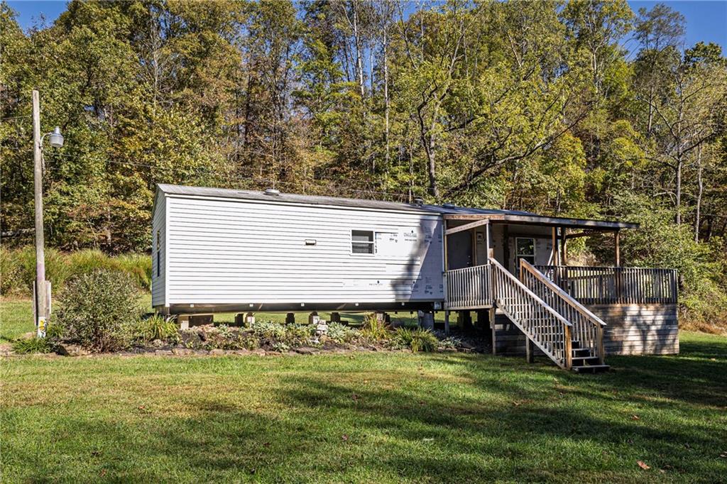 476 Hewitt Run Wind Ridge, PA 15380 - Photo 5 of 28 a view of a house with backyard