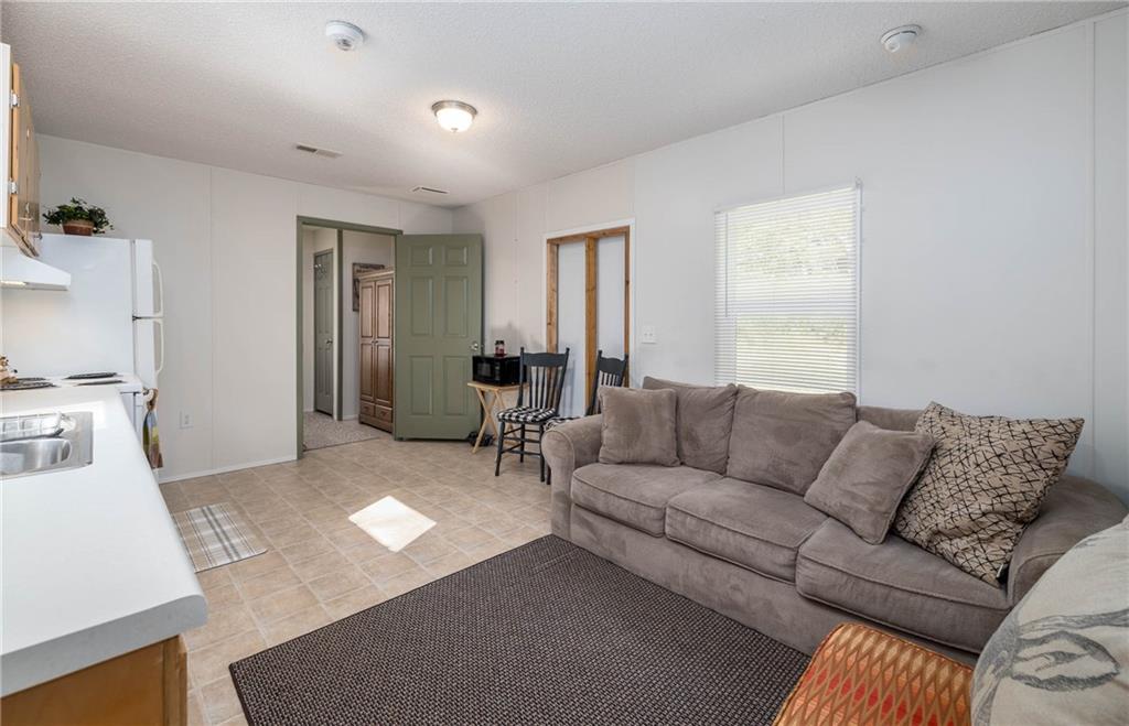 476 Hewitt Run Wind Ridge, PA 15380 - Photo 6 of 28 a living room with furniture and a couch