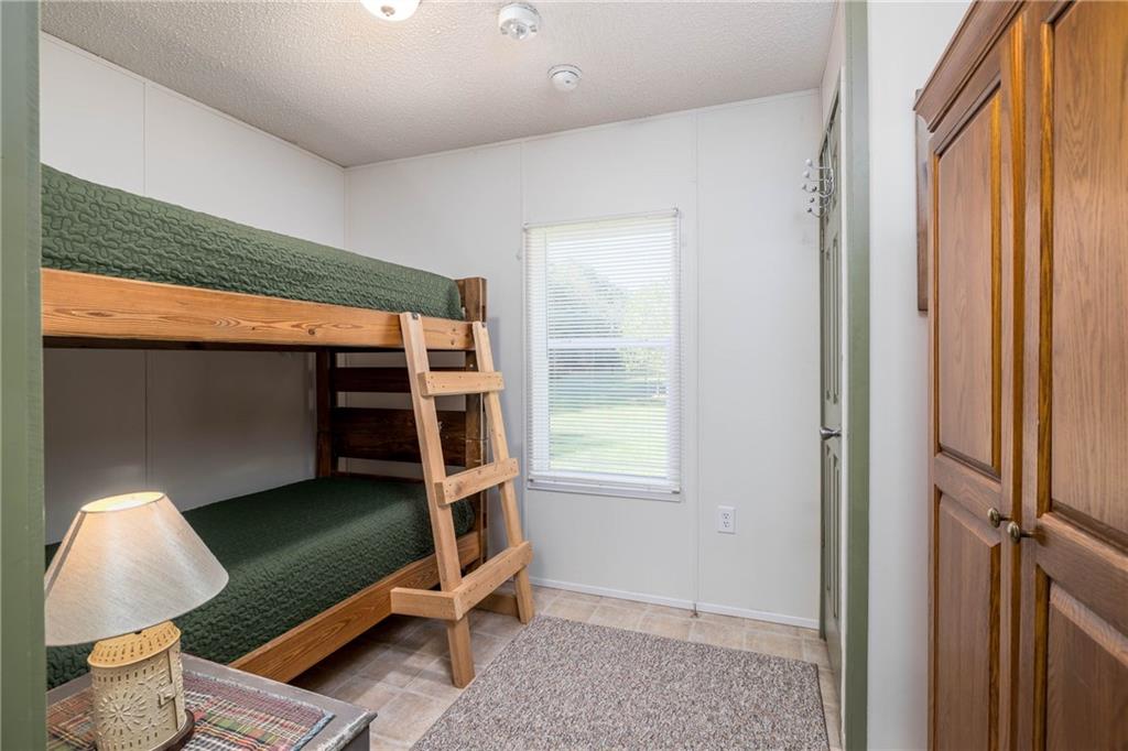 476 Hewitt Run Wind Ridge, PA 15380 - Photo 9 of 28 a room with furniture and a window
