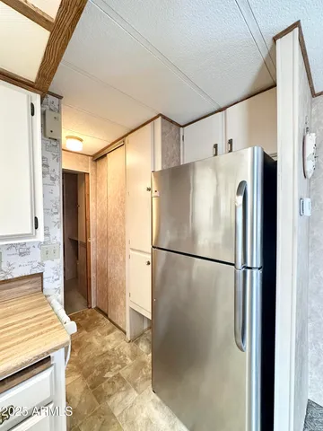 a kitchen with a sink and a window