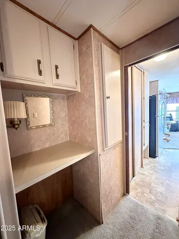 a bathroom with a bathtub and a window