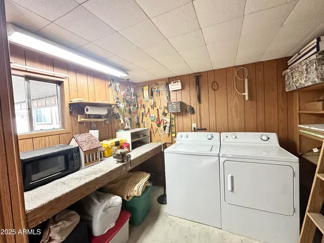 a view of kitchen with cabinets and wooden floor