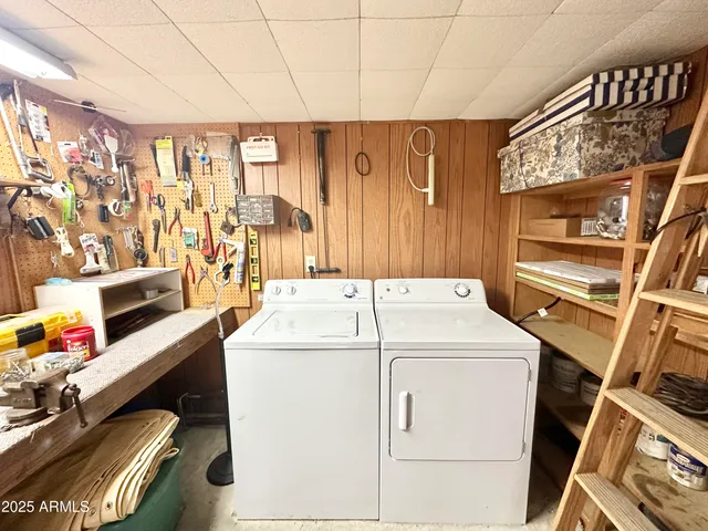 a utility room with dryer and washer