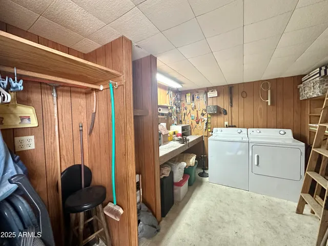 a bathroom with a double vanity sink and mirror
