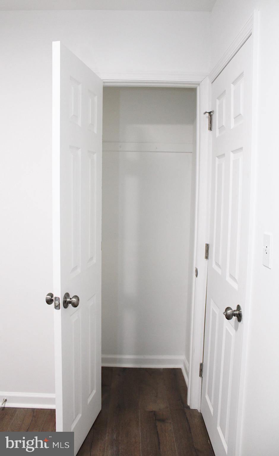 1128 West Browning Road, Unit 1 Bellmawr, NJ 08031 - Photo 13 of 19 a view of a hallway with wooden floor