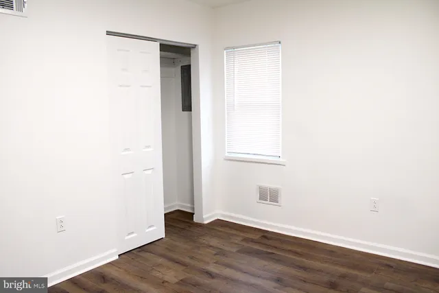 a bathroom with a shower and a toilet