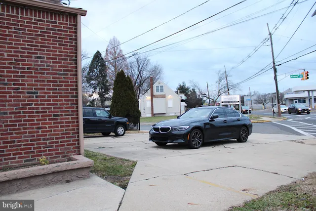 a view of a street with cars