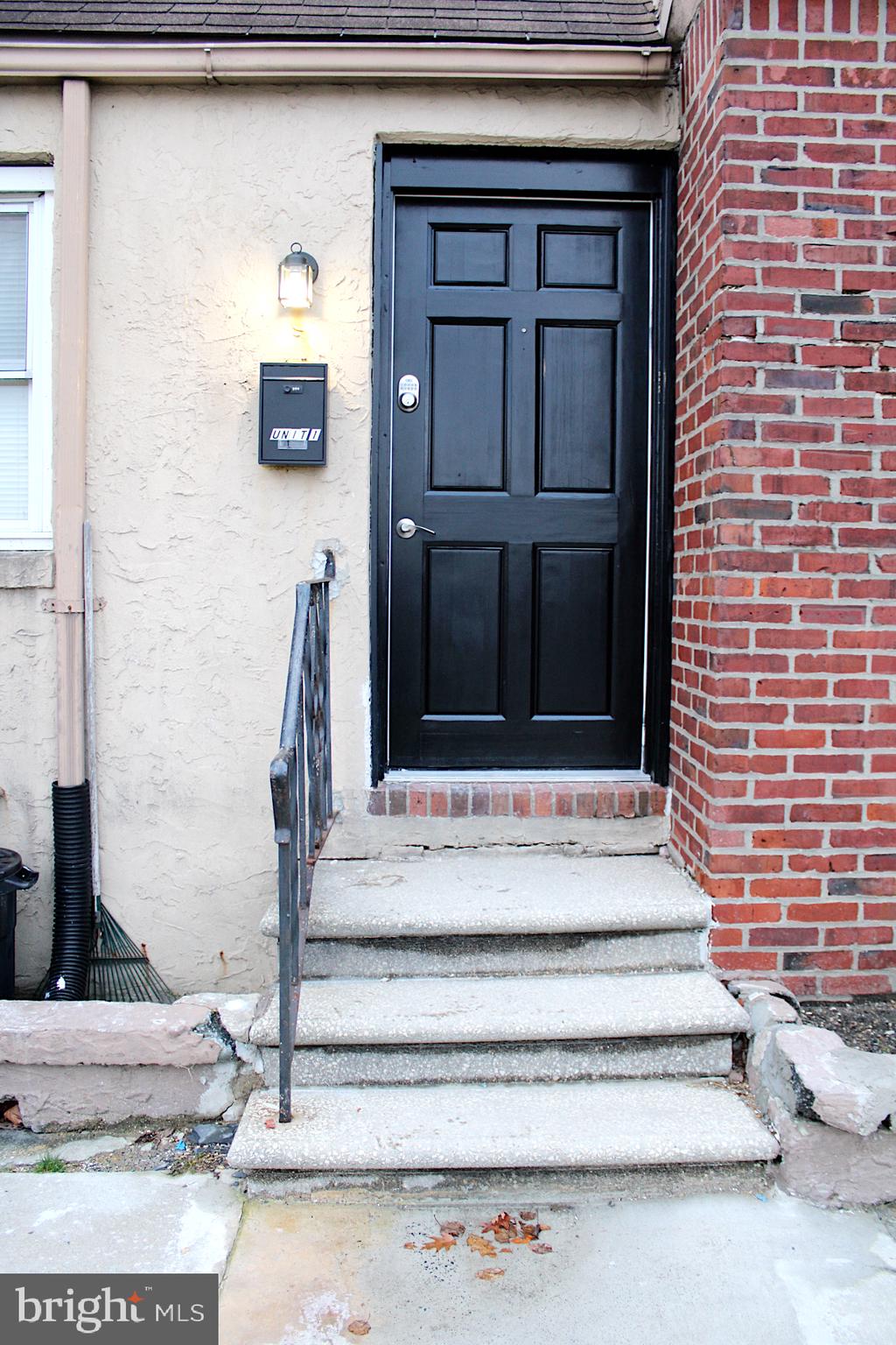 1128 West Browning Road, Unit 1 Bellmawr, NJ 08031 - Photo 2 of 19 a view of entrance