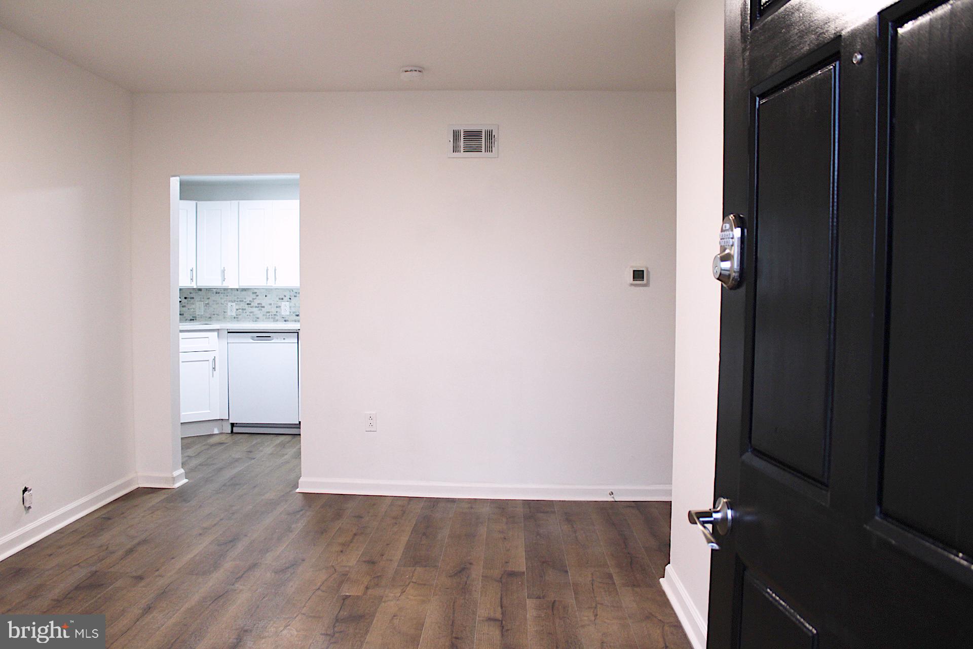 1128 West Browning Road, Unit 1 Bellmawr, NJ 08031 - Photo 3 of 19 wooden floor in an empty room