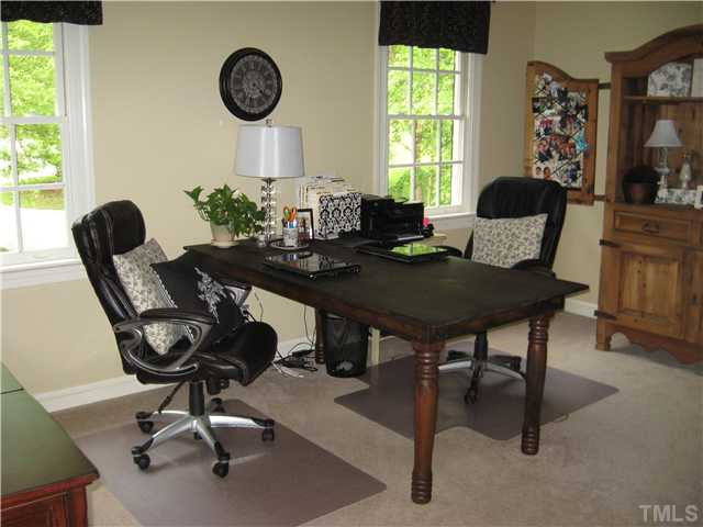 14405 Possum Track Road Raleigh, NC 27614 - Photo 12 of 25 this large secondary bedroom is now used as an office and crafts area Bedroom