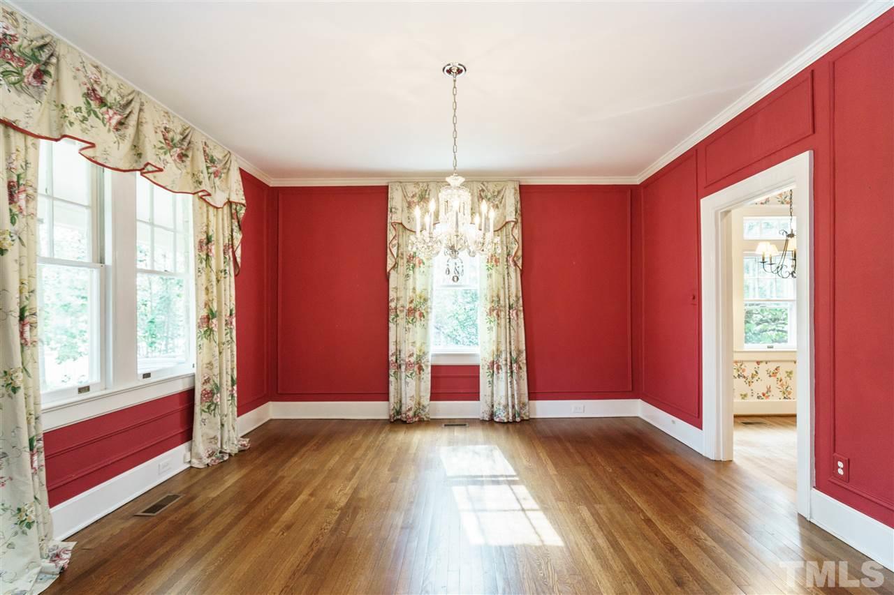 1621 St Marys Street Raleigh, NC 27608 - Photo 4 of 25 a view of a room with window wooden floor and front door