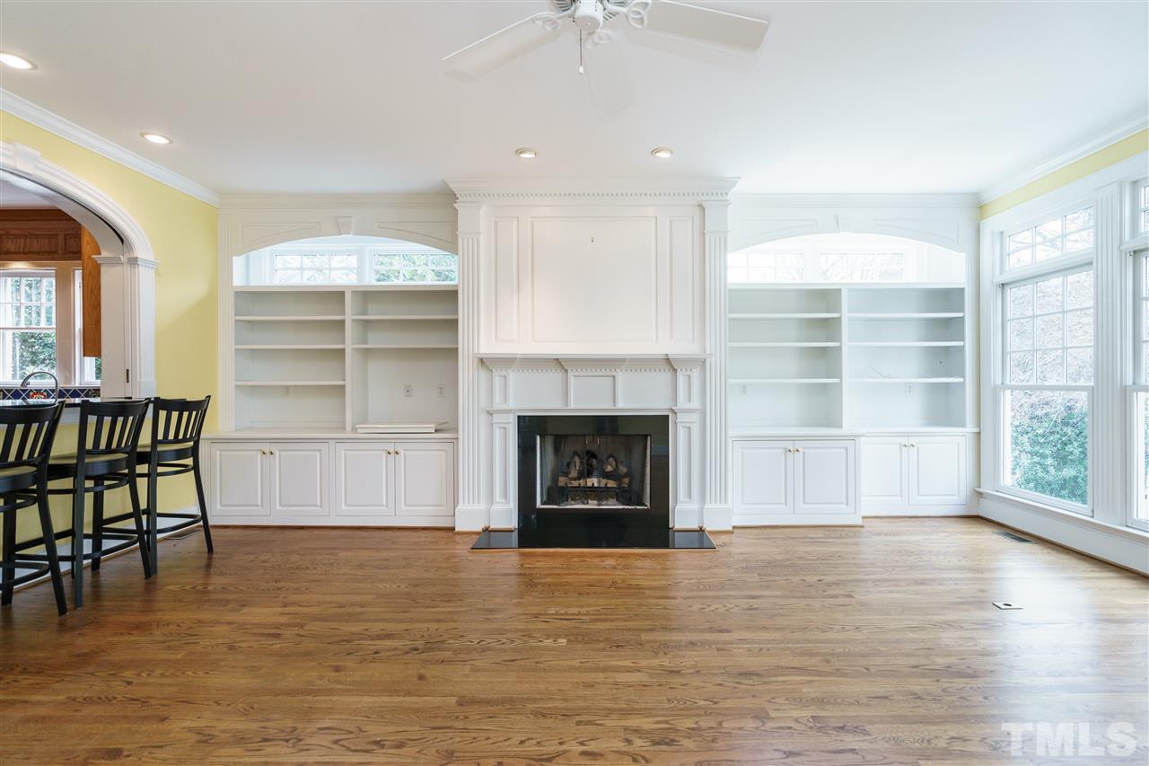1621 St Marys Street Raleigh, NC 27608 - Photo 10 of 25 a view of a livingroom with a fireplace and window