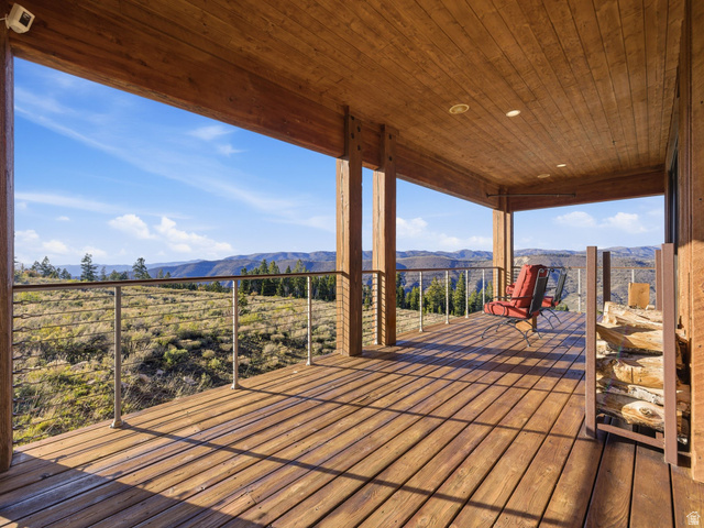 22677 East Snowbird Drive, Unit 47 Helper, UT 84526 - Photo 3 of 43 Wooden deck featuring a patio and a mountain view