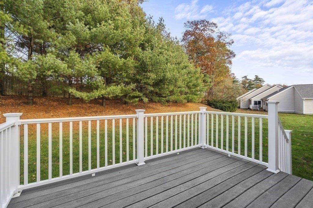4 Strawberry Lane, Unit E Hudson, MA 01749 - Photo 2 of 40 a view of wooden deck