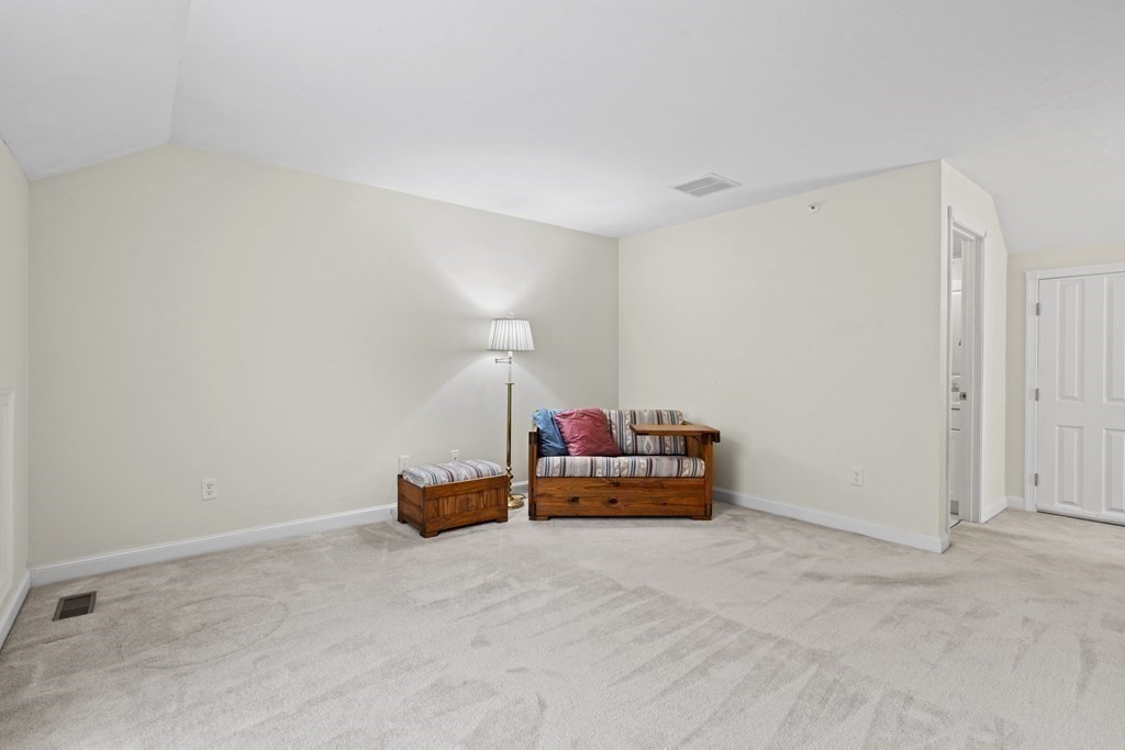 4 Strawberry Lane, Unit E Hudson, MA 01749 - Photo 23 of 40 a view of a room with natural light