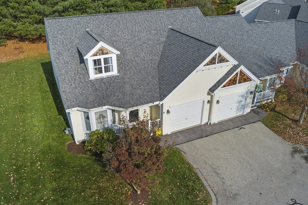 4 Strawberry Lane, Unit E Hudson, MA 01749 - Photo 34 of 40 an aerial view of house with yard
