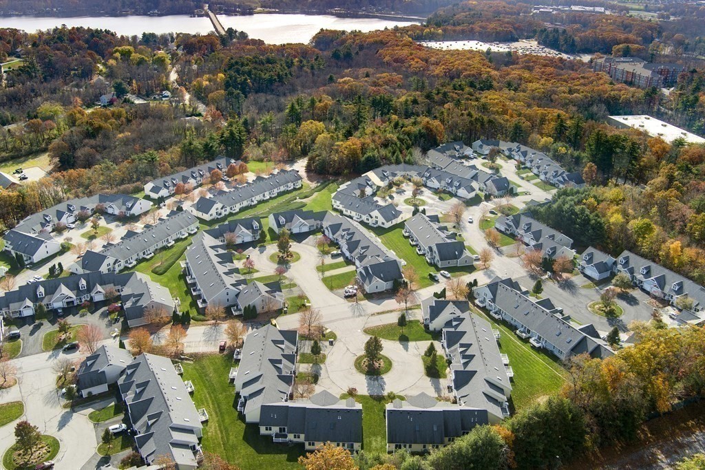 4 Strawberry Lane, Unit E Hudson, MA 01749 - Photo 38 of 40 an aerial view of residential houses with outdoor space