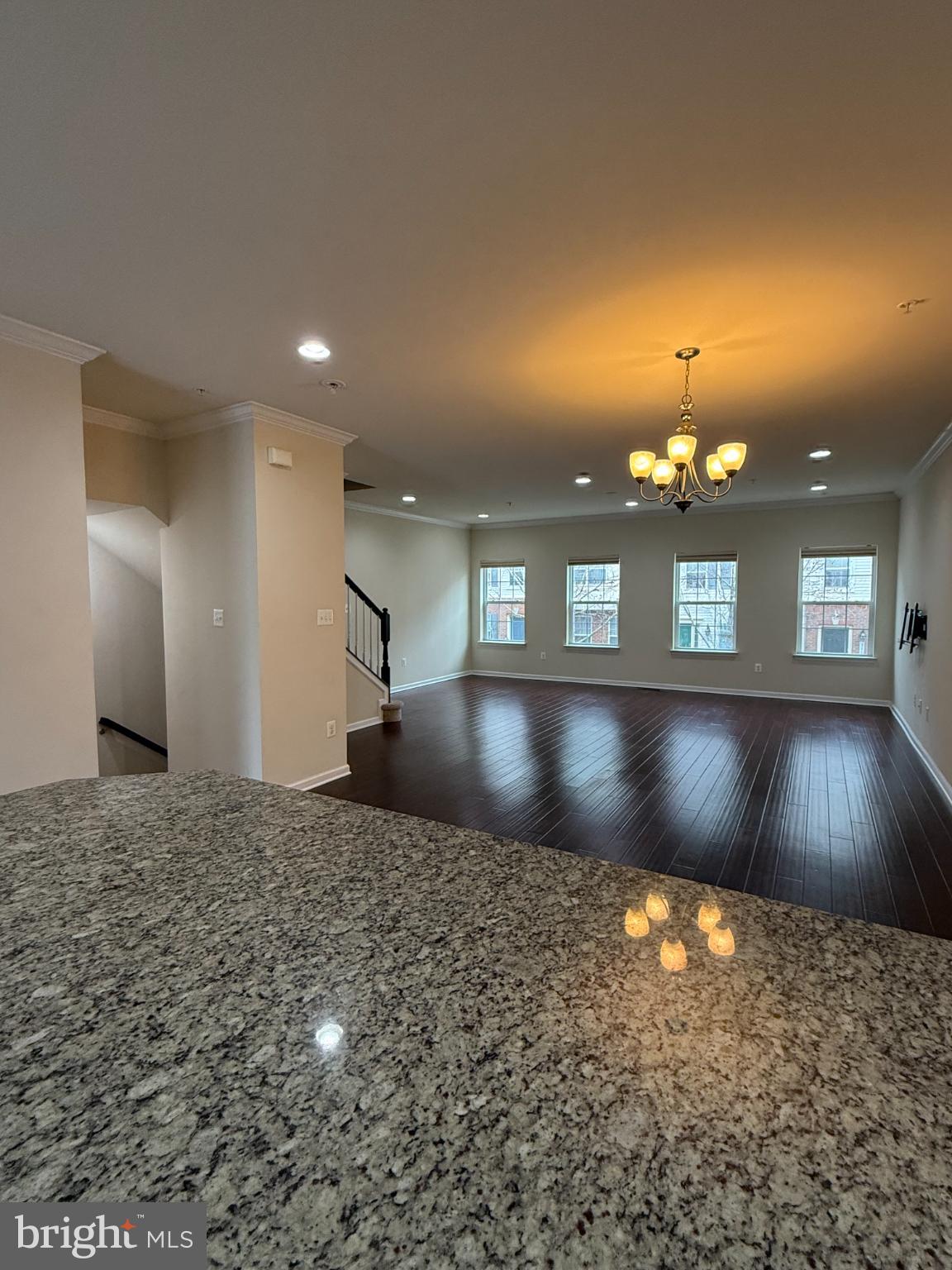7018 Foxton Way Hanover, MD 21076 - Photo 14 of 72 Spacious living area with elegant lighting.