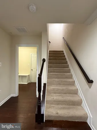 a view of a livingroom with wooden floor