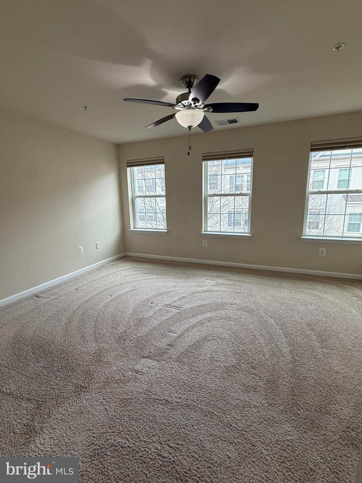 7018 Foxton Way Hanover, MD 21076 - Photo 36 of 72 a view of room window and ceiling fan