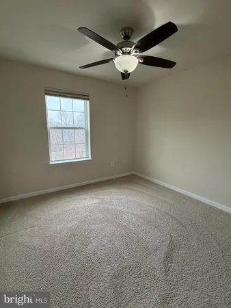 a front view of a house with garage