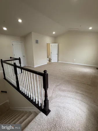 a view of a porch with a small yard