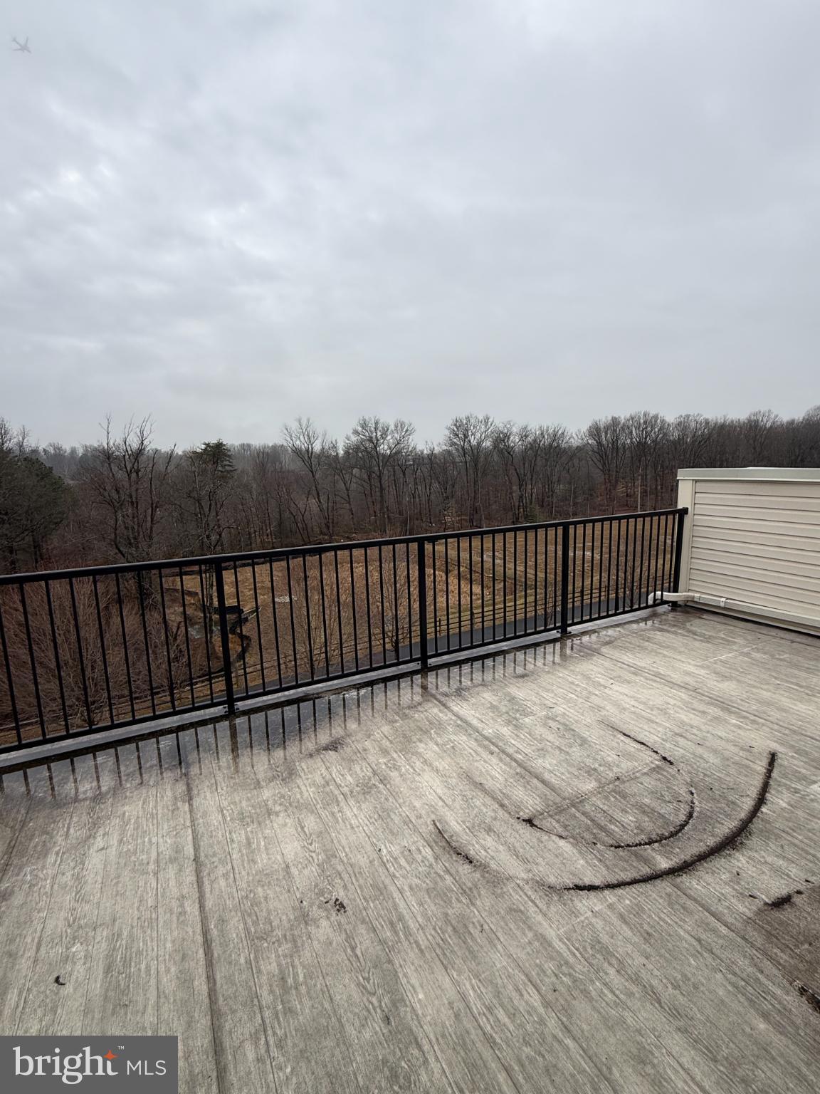 7018 Foxton Way Hanover, MD 21076 - Photo 53 of 72 Serene balcony with nature views.