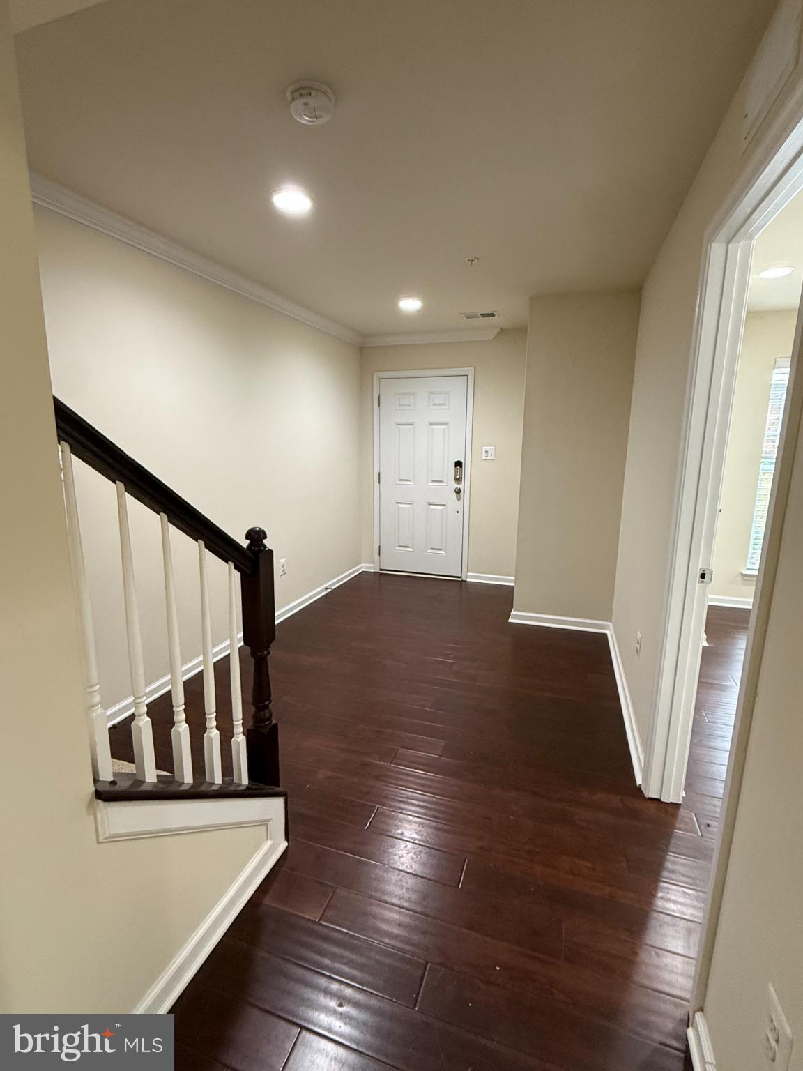 7018 Foxton Way Hanover, MD 21076 - Photo 6 of 72 a view of entryway with wooden floor