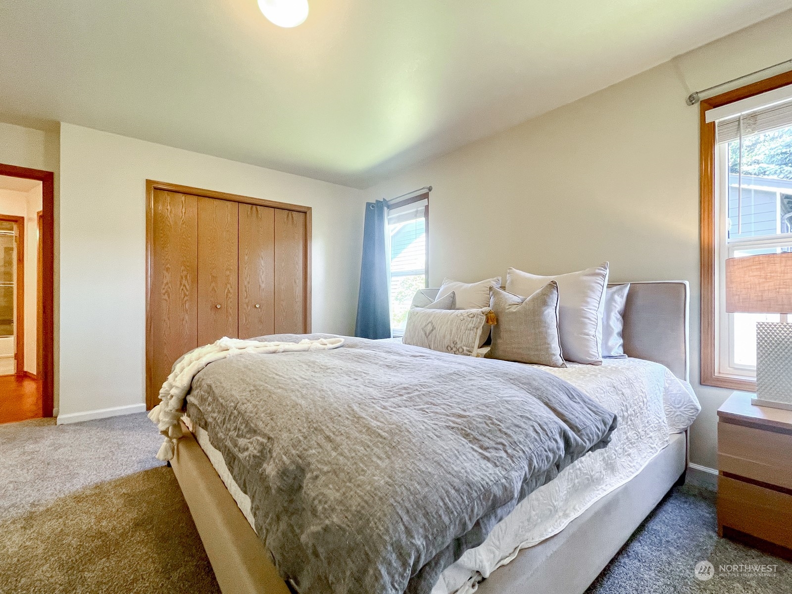 4019 Northeast 17th Street Renton, WA 98056 - Photo 18 of 37 a bedroom with a bed and a window