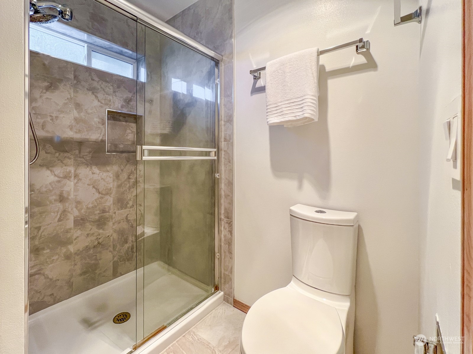 4019 Northeast 17th Street Renton, WA 98056 - Photo 22 of 37 a bathroom with a shower a toilet and sink