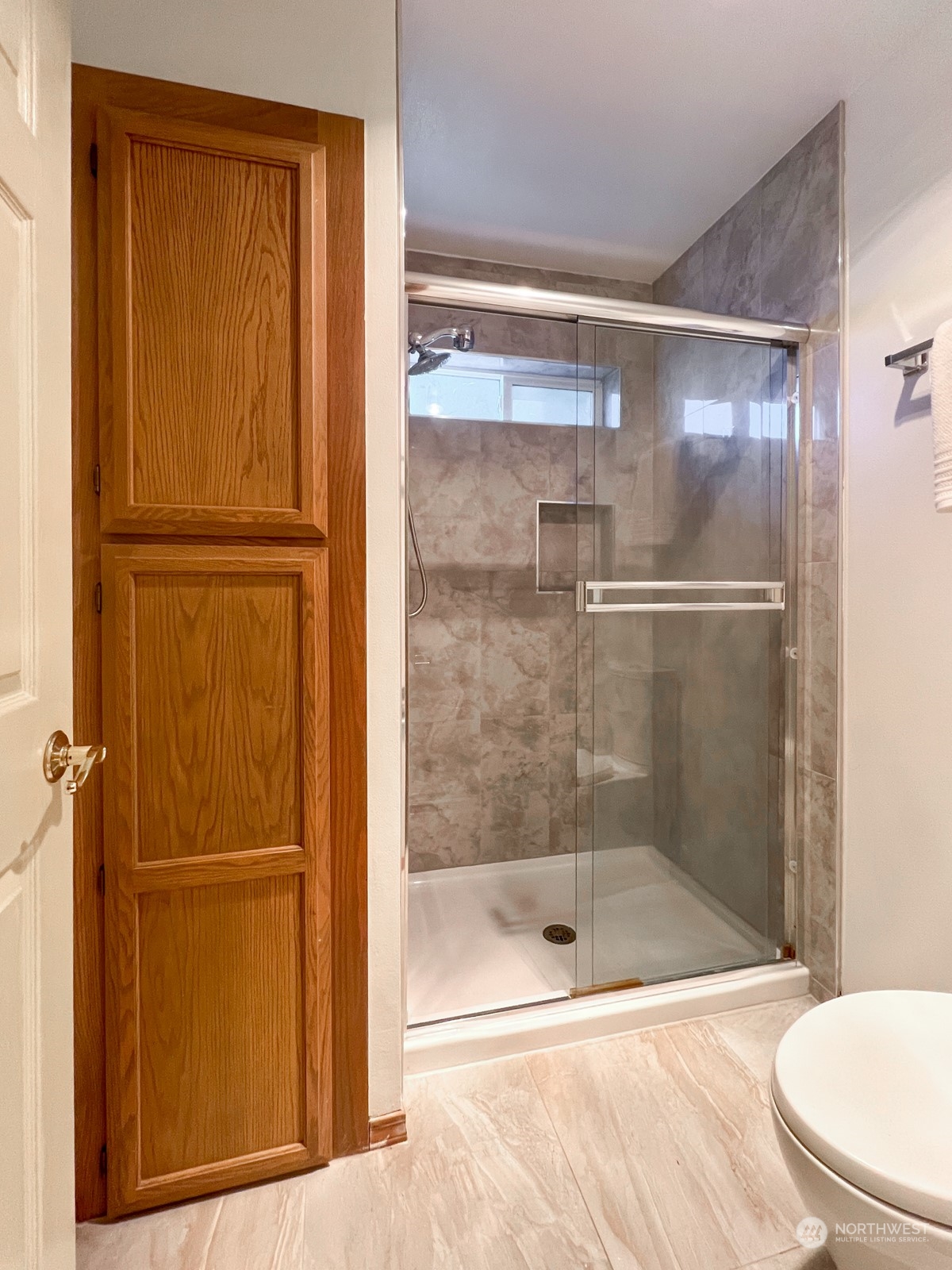 4019 Northeast 17th Street Renton, WA 98056 - Photo 23 of 37 a bathroom with a granite countertop bathtub shower