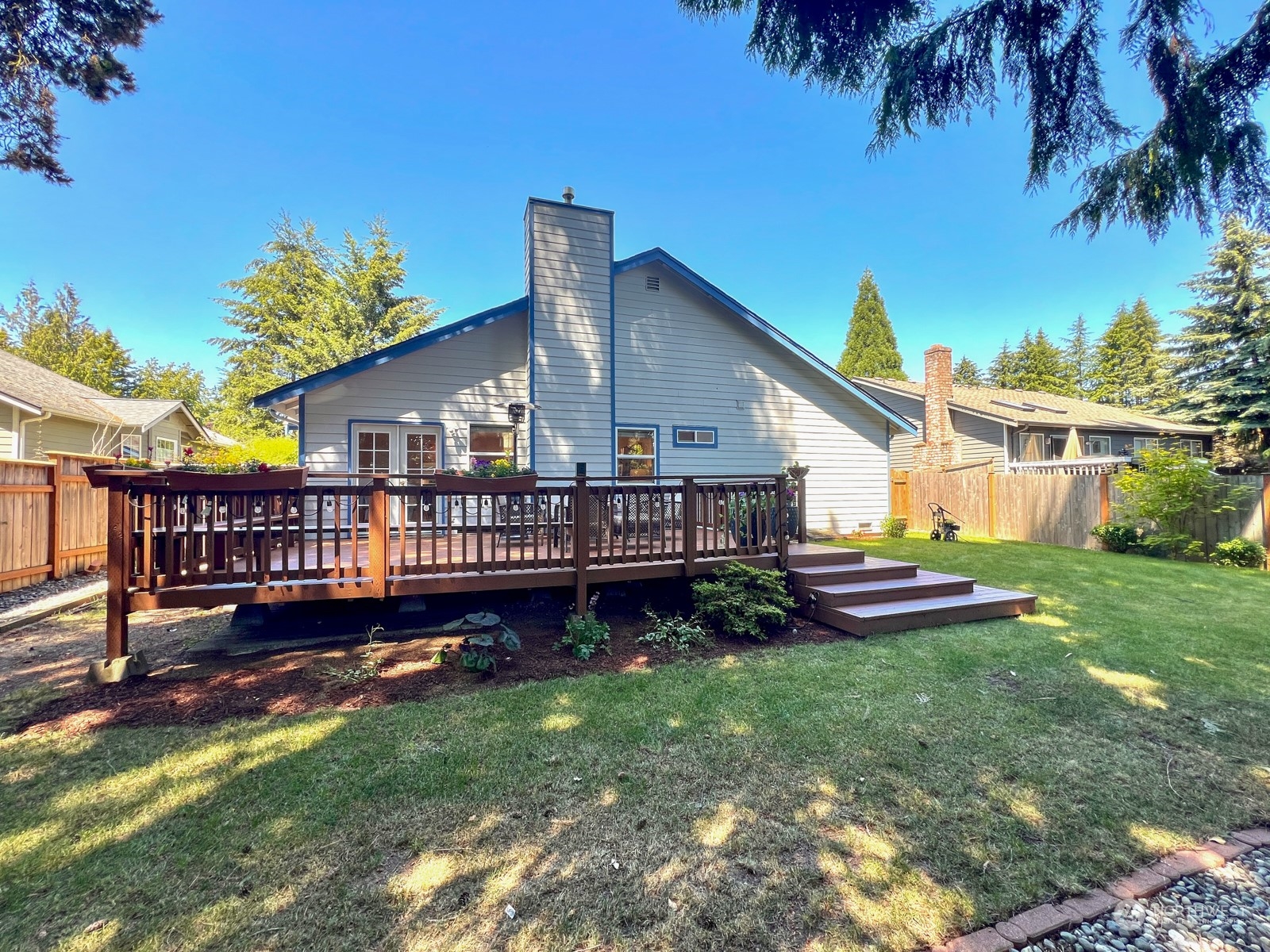 4019 Northeast 17th Street Renton, WA 98056 - Photo 34 of 37 a view of a house with a yard and a patio