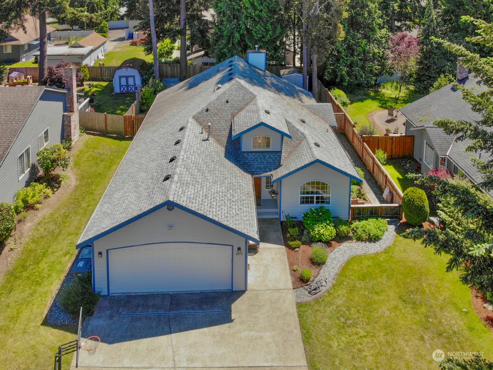 4019 Northeast 17th Street Renton, WA 98056 - Photo 37 of 37 an aerial view of a house with a yard and balcony