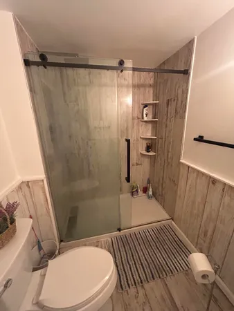 a bathroom with a sink and toilet