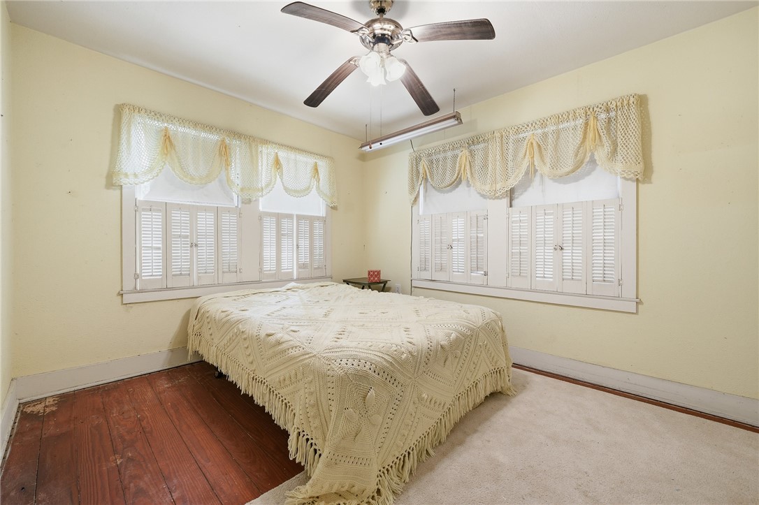 301 Laurel Street Fulton, TX 78382 - Photo 13 of 20 a spacious bedroom with a bed and a window