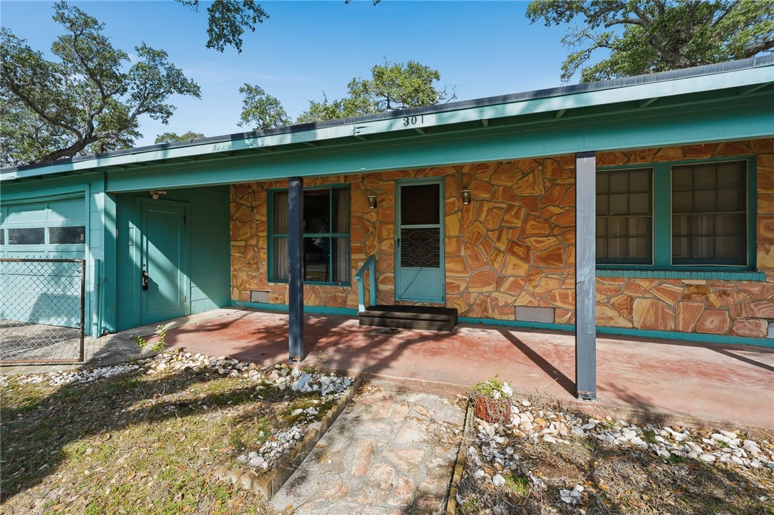301 Laurel Street Fulton, TX 78382 - Photo 3 of 20 a view of a house with a backyard